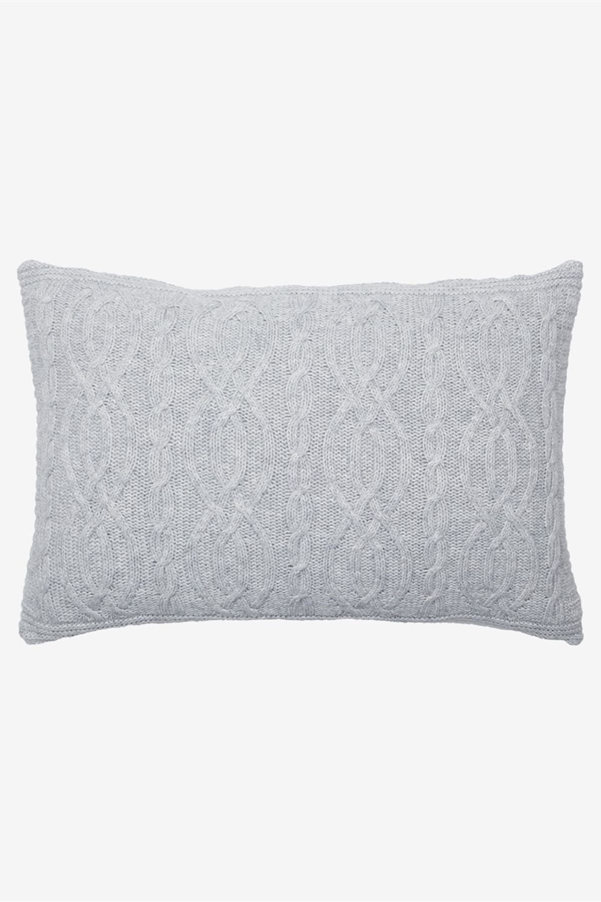 Housse de coussin tricotée en laine torsadée gris clair